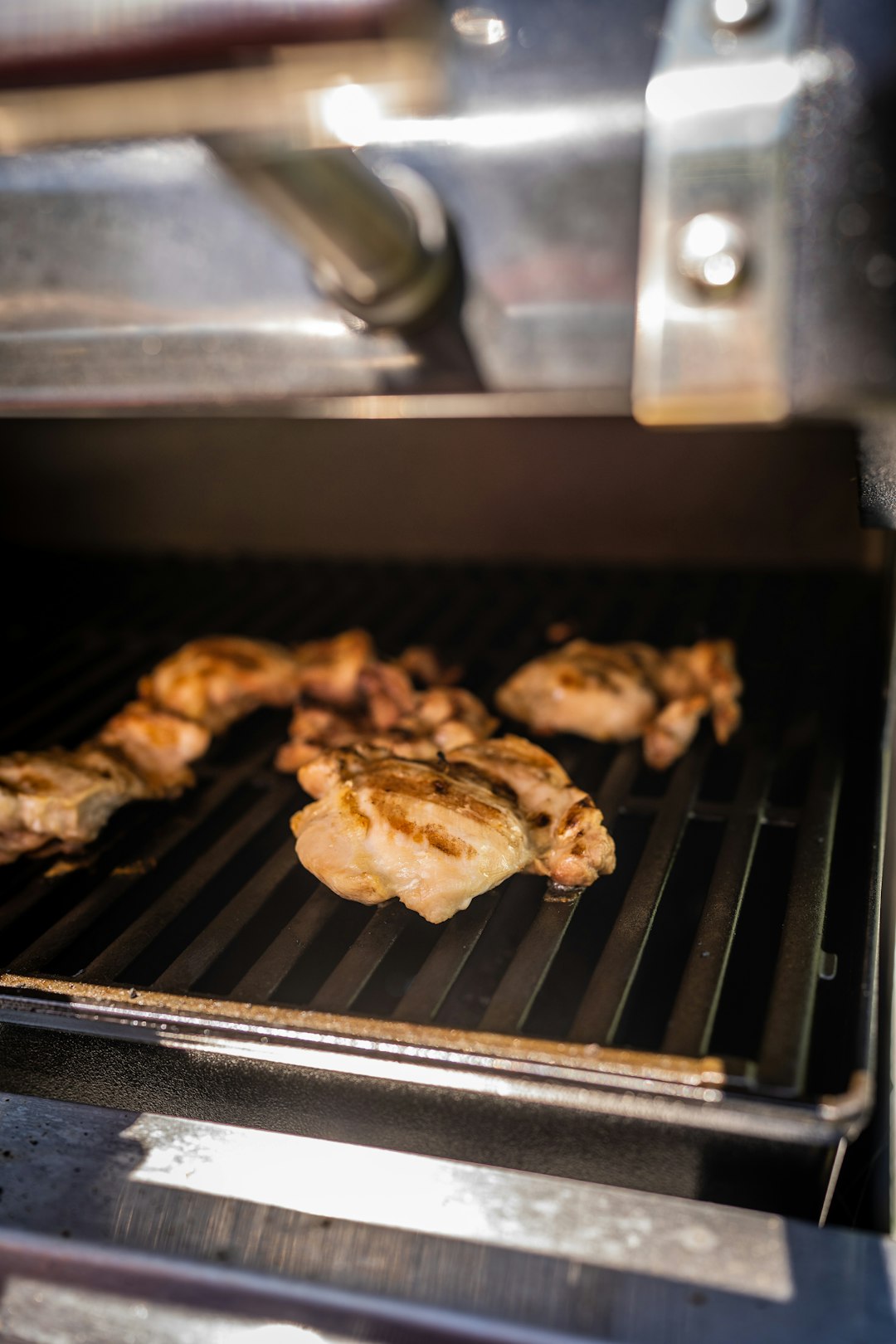 Chicken cooking on an electric grill